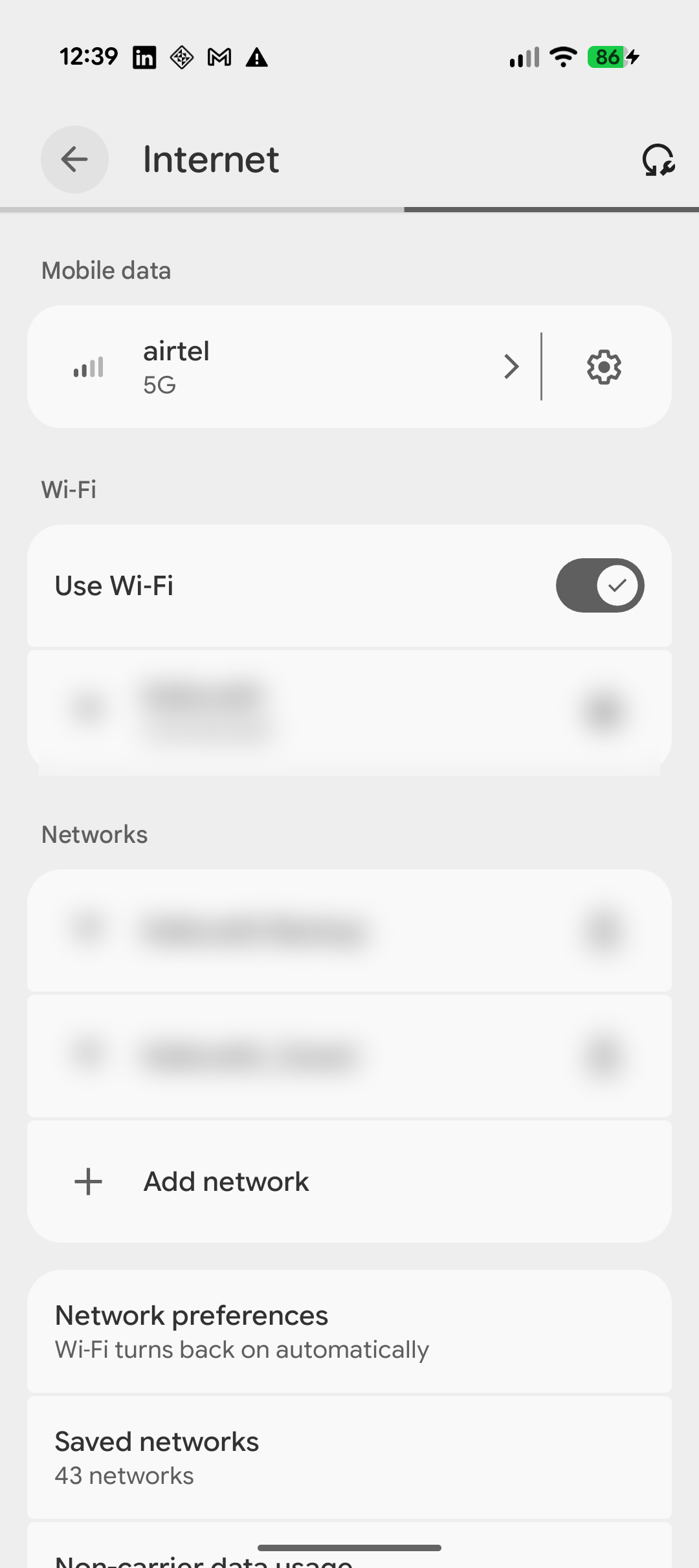 Android Wi-Fi settings screen showing the connected network with a gear icon